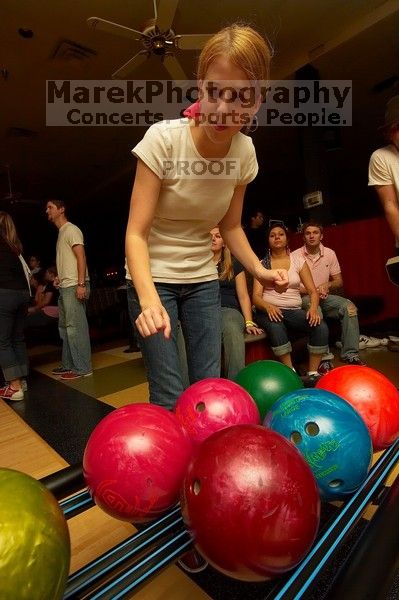 Alpha Xi Delta held a sock hop themed date night at the Austin 300 bowling alley, Thursday night, March 29, 2007.

Filename: SRM_20070329_2103064.jpg
Aperture: f/8.0
Shutter Speed: 1/200
Body: Canon EOS-1D Mark II
Lens: Sigma 15-30mm f/3.5-4.5 EX Aspherical DG DF