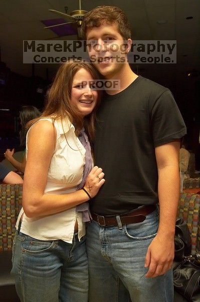 Stacy McKenney and Craig Zwerneman.  Alpha Xi Delta held a sock hop themed date night at the Austin 300 bowling alley, Thursday night, March 29, 2007.

Filename: SRM_20070329_2108003.jpg
Aperture: f/8.0
Shutter Speed: 1/200
Body: Canon EOS-1D Mark II
Lens: Sigma 15-30mm f/3.5-4.5 EX Aspherical DG DF