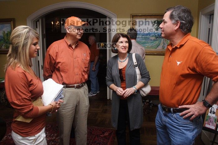 Maggie Hines and her parents.  Kappa Kappa Gamma (KKG) hosted a parents' weekend barbecue before the UT vs Nebraska football game on Saturday, October 27, 2007 at their sorority house.

Filename: SRM_20071027_1156169.jpg
Aperture: f/8.0
Shutter Speed: 1/250
Body: Canon EOS 20D
Lens: Canon EF-S 18-55mm f/3.5-5.6