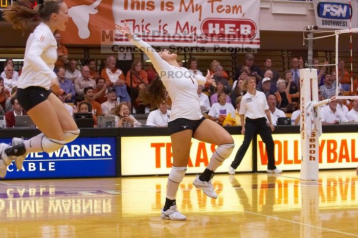 UT junior Kiley Hall (#11, DS/L) and UT freshman Juliann Faucette (#1, OH) are ecstatic after a point.  The Longhorns defeated the Huskers 3-0 on Wednesday night, October 24, 2007 at Gregory Gym.

Filename: SRM_20071024_1954467.jpg
Aperture: f/4.0
Shutter Speed: 1/400
Body: Canon EOS-1D Mark II
Lens: Canon EF 80-200mm f/2.8 L