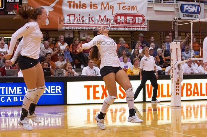 UT junior Kiley Hall (#11, DS/L) and UT freshman Juliann Faucette (#1, OH) are ecstatic after a point.  The Longhorns defeated the Huskers 3-0 on Wednesday night, October 24, 2007 at Gregory Gym.

Filename: SRM_20071024_1954488.jpg
Aperture: f/4.0
Shutter Speed: 1/400
Body: Canon EOS-1D Mark II
Lens: Canon EF 80-200mm f/2.8 L