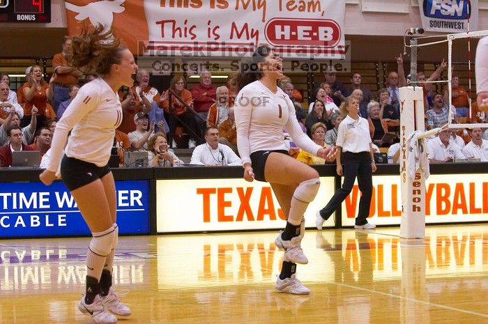 UT junior Kiley Hall (#11, DS/L) and UT freshman Juliann Faucette (#1, OH) are ecstatic after a point.  The Longhorns defeated the Huskers 3-0 on Wednesday night, October 24, 2007 at Gregory Gym.

Filename: SRM_20071024_1954489.jpg
Aperture: f/4.0
Shutter Speed: 1/400
Body: Canon EOS-1D Mark II
Lens: Canon EF 80-200mm f/2.8 L