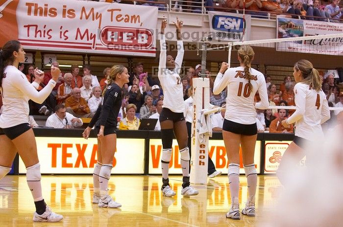 UT freshman Juliann Faucette (#1, OH), UT senior Alyson Jennings (#16, L), UT sophomore Destinee Hooker (#21, OH), UT sophomore Ashley Engle (#10, S/RS) and UT senior Michelle Moriarty (#4, S) celebrate after a point.  The Longhorns defeated the Huskers 3-

Filename: SRM_20071024_2007085.jpg
Aperture: f/4.0
Shutter Speed: 1/320
Body: Canon EOS-1D Mark II
Lens: Canon EF 80-200mm f/2.8 L