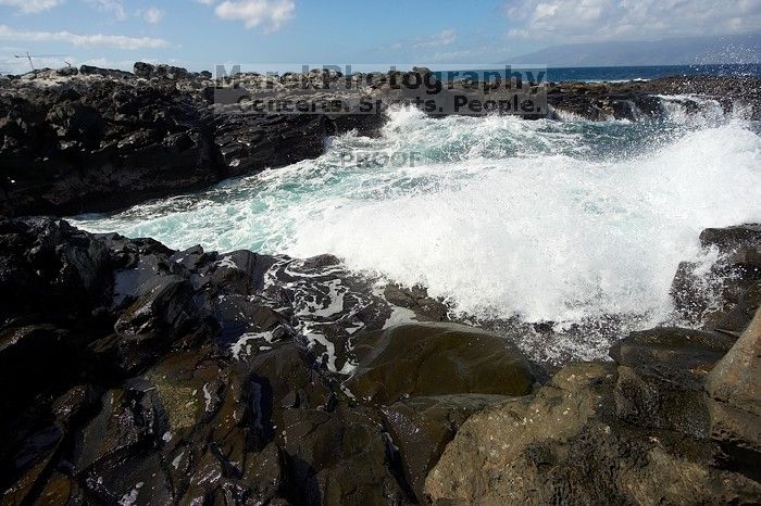 Hike to the Nakalele blowholes along the surf-beaten lava formations.

Filename: SRM_20071219_1227331.jpg
Aperture: f/8.0
Shutter Speed: 1/3200
Body: Canon EOS-1D Mark II
Lens: Sigma 15-30mm f/3.5-4.5 EX Aspherical DG DF