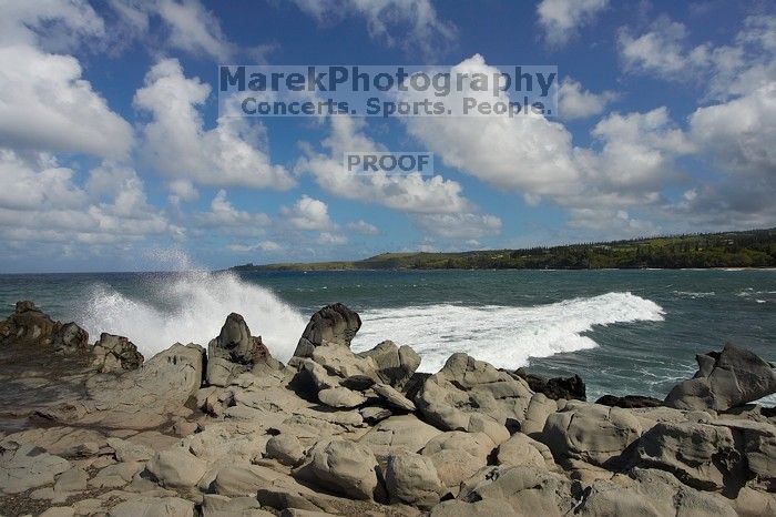 Hike to the Nakalele blowholes along the surf-beaten lava formations.

Filename: SRM_20071219_1234547.jpg
Aperture: f/8.0
Shutter Speed: 1/5000
Body: Canon EOS-1D Mark II
Lens: Sigma 15-30mm f/3.5-4.5 EX Aspherical DG DF