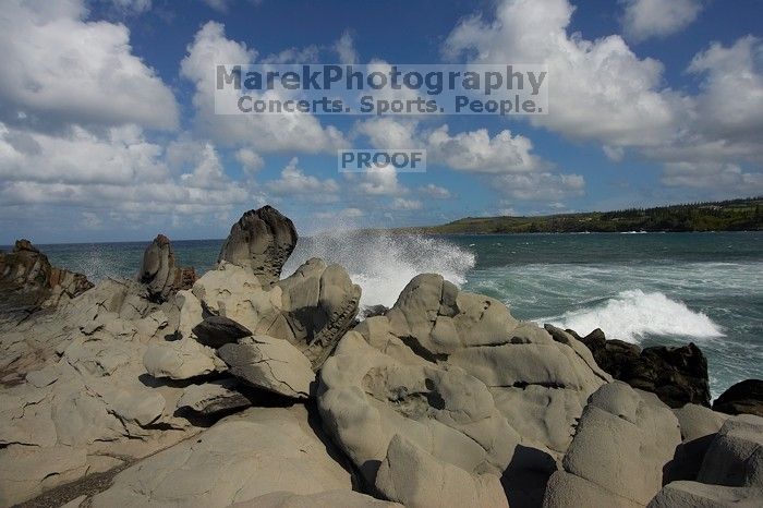 Hike to the Nakalele blowholes along the surf-beaten lava formations.

Filename: SRM_20071219_1235221.jpg
Aperture: f/8.0
Shutter Speed: 1/6400
Body: Canon EOS-1D Mark II
Lens: Sigma 15-30mm f/3.5-4.5 EX Aspherical DG DF