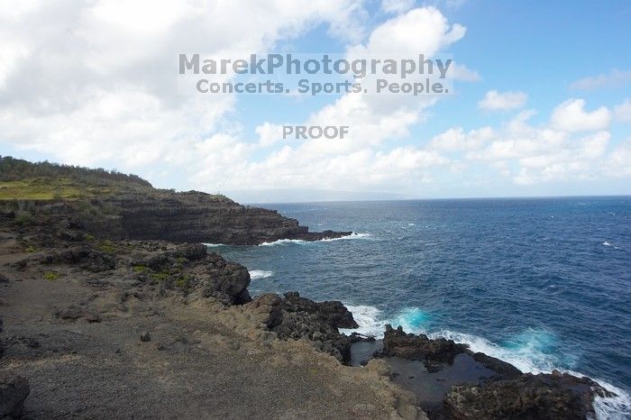 Hike to the Nakalele blowholes along the surf-beaten lava formations.

Filename: SRM_20071219_1324226.jpg
Aperture: f/10.0
Shutter Speed: 1/800
Body: Canon EOS-1D Mark II
Lens: Sigma 15-30mm f/3.5-4.5 EX Aspherical DG DF