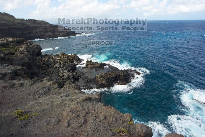 Hike to the Nakalele blowholes along the surf-beaten lava formations.

Filename: SRM_20071219_1325319.jpg
Aperture: f/10.0
Shutter Speed: 1/800
Body: Canon EOS-1D Mark II
Lens: Sigma 15-30mm f/3.5-4.5 EX Aspherical DG DF