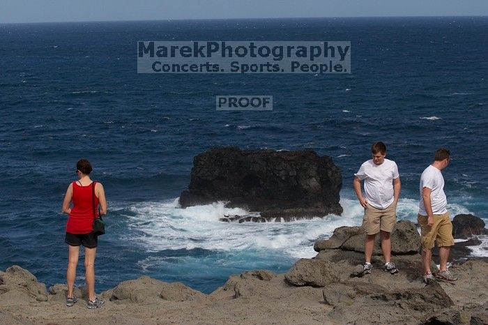 Carolyn Bayer, Justin Shofner, and Daniel Carr.  Hike to the Nakalele blowholes along the surf-beaten lava formations.

Filename: SRM_20071219_1333226.jpg
Aperture: f/8.0
Shutter Speed: 1/2000
Body: Canon EOS 20D
Lens: Canon EF 80-200mm f/2.8 L