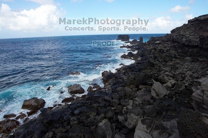 Hike to the Nakalele blowholes along the surf-beaten lava formations.

Filename: SRM_20071219_1337470.jpg
Aperture: f/10.0
Shutter Speed: 1/800
Body: Canon EOS-1D Mark II
Lens: Sigma 15-30mm f/3.5-4.5 EX Aspherical DG DF