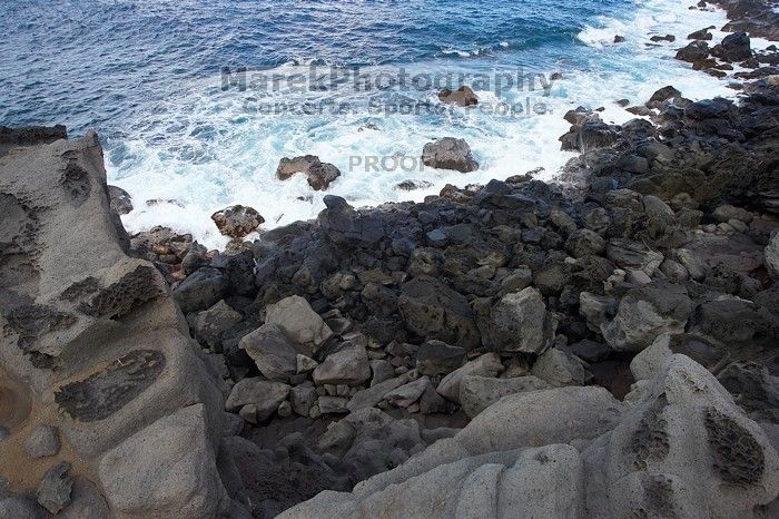 Hike to the Nakalele blowholes along the surf-beaten lava formations.

Filename: SRM_20071219_1338298.jpg
Aperture: f/10.0
Shutter Speed: 1/500
Body: Canon EOS-1D Mark II
Lens: Sigma 15-30mm f/3.5-4.5 EX Aspherical DG DF