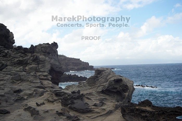 Hike to the Nakalele blowholes along the surf-beaten lava formations.

Filename: SRM_20071219_1338599.jpg
Aperture: f/10.0
Shutter Speed: 1/640
Body: Canon EOS-1D Mark II
Lens: Sigma 15-30mm f/3.5-4.5 EX Aspherical DG DF