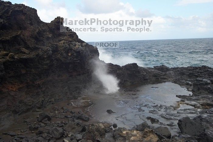 Hike to the Nakalele blowholes along the surf-beaten lava formations.

Filename: SRM_20071219_1341385.jpg
Aperture: f/10.0
Shutter Speed: 1/250
Body: Canon EOS-1D Mark II
Lens: Sigma 15-30mm f/3.5-4.5 EX Aspherical DG DF