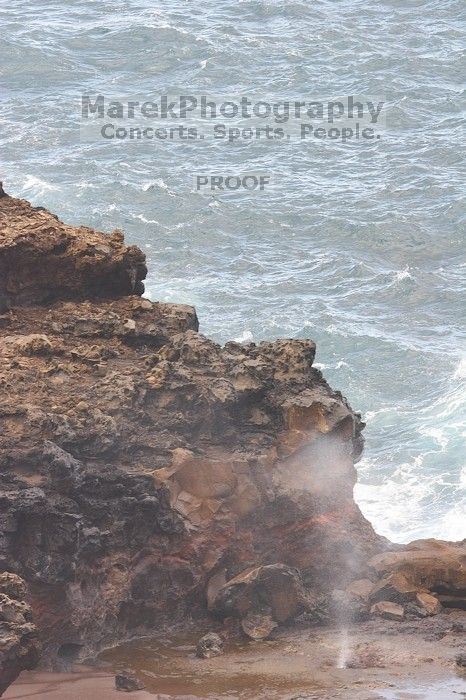 Hike to the Nakalele blowholes along the surf-beaten lava formations.

Filename: SRM_20071219_1412560.jpg
Aperture: f/5.6
Shutter Speed: 1/400
Body: Canon EOS 20D
Lens: Canon EF 300mm f/2.8 L IS