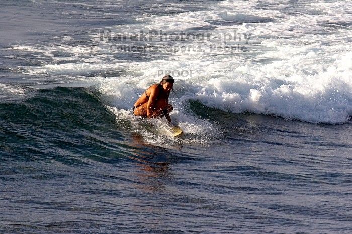 Surfers in Honolua Bay, Maui, Hawai'i, 2007.

Filename: SRM_20071217_1627268.jpg
Aperture: f/8.0
Shutter Speed: 1/1000
Body: Canon EOS 20D
Lens: Canon EF 300mm f/2.8 L IS