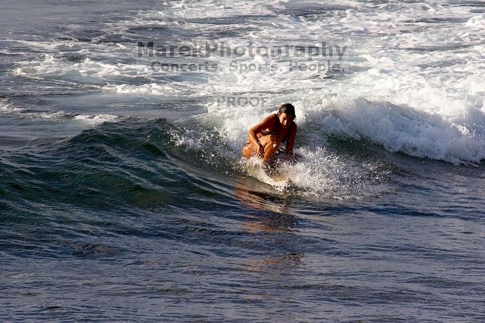 Surfers in Honolua Bay, Maui, Hawai'i, 2007.

Filename: SRM_20071217_1627279.jpg
Aperture: f/8.0
Shutter Speed: 1/1000
Body: Canon EOS 20D
Lens: Canon EF 300mm f/2.8 L IS