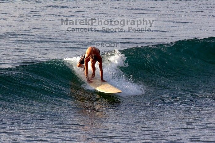 Surfers in Honolua Bay, Maui, Hawai'i, 2007.

Filename: SRM_20071217_1628181.jpg
Aperture: f/8.0
Shutter Speed: 1/800
Body: Canon EOS 20D
Lens: Canon EF 300mm f/2.8 L IS