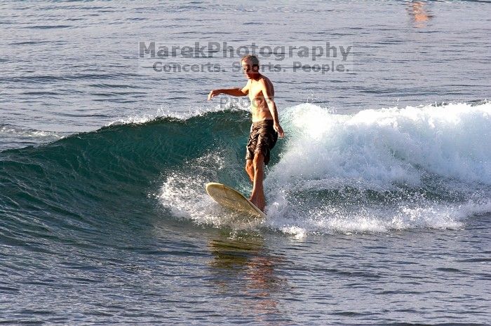 Surfers in Honolua Bay, Maui, Hawai'i, 2007.

Filename: SRM_20071217_1628194.jpg
Aperture: f/8.0
Shutter Speed: 1/800
Body: Canon EOS 20D
Lens: Canon EF 300mm f/2.8 L IS