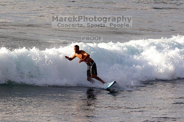 Surfers in Honolua Bay, Maui, Hawai'i, 2007.

Filename: SRM_20071217_1631376.jpg
Aperture: f/8.0
Shutter Speed: 1/1250
Body: Canon EOS 20D
Lens: Canon EF 300mm f/2.8 L IS