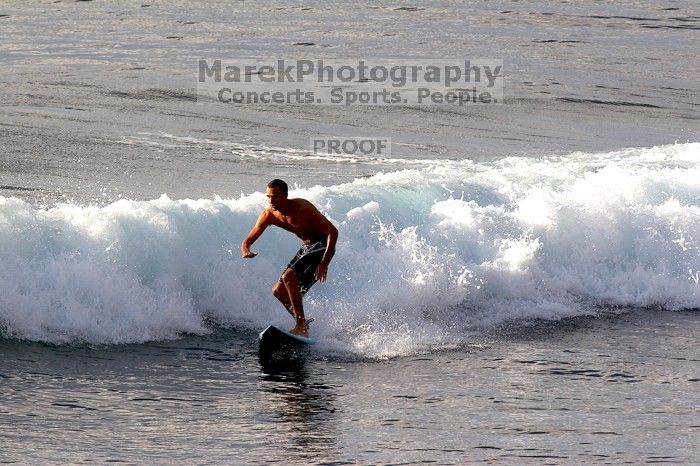 Surfers in Honolua Bay, Maui, Hawai'i, 2007.

Filename: SRM_20071217_1631377.jpg
Aperture: f/8.0
Shutter Speed: 1/1250
Body: Canon EOS 20D
Lens: Canon EF 300mm f/2.8 L IS