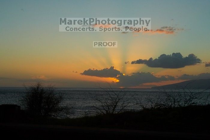 Sunset over the island of Lanai in Lahaina, Maui, Hawai'i, 2007.

Filename: SRM_20071219_1746281.jpg
Aperture: f/8.0
Shutter Speed: 1/320
Body: Canon EOS-1D Mark II
Lens: Canon EF 50mm f/1.8 II