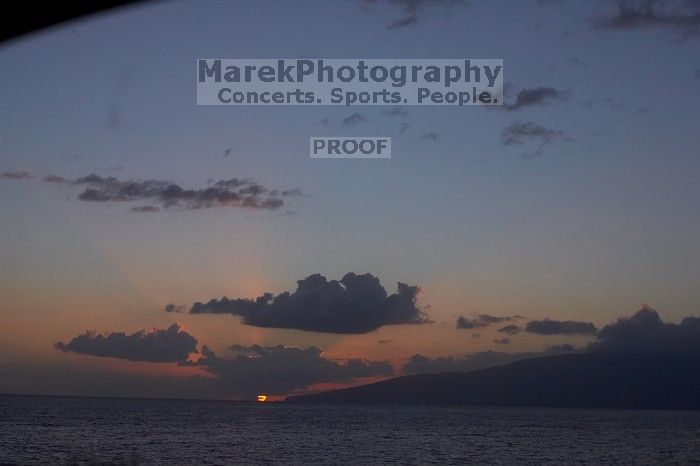 Sunset over the island of Lanai in Lahaina, Maui, Hawai'i, 2007.

Filename: SRM_20071219_1747482.jpg
Aperture: f/8.0
Shutter Speed: 1/320
Body: Canon EOS-1D Mark II
Lens: Canon EF 50mm f/1.8 II