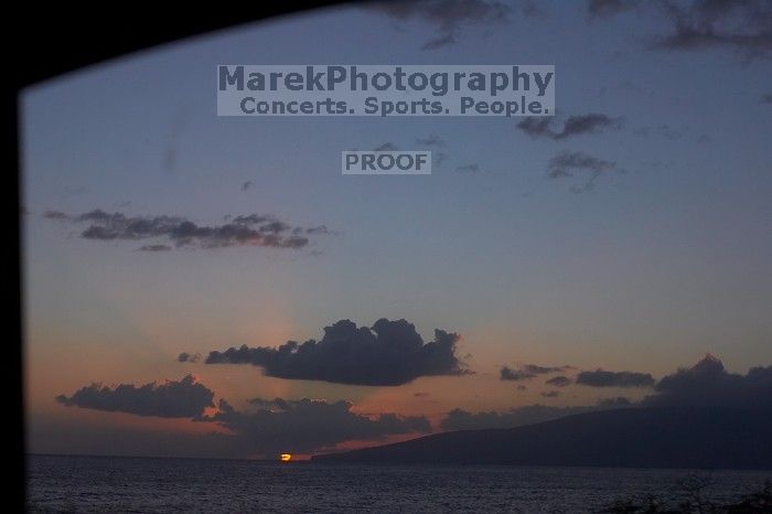 Sunset over the island of Lanai in Lahaina, Maui, Hawai'i, 2007.

Filename: SRM_20071219_1747495.jpg
Aperture: f/8.0
Shutter Speed: 1/320
Body: Canon EOS-1D Mark II
Lens: Canon EF 50mm f/1.8 II