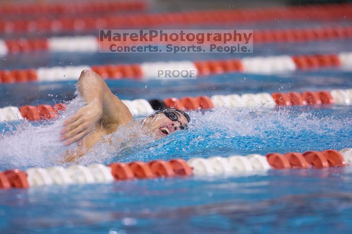 UT sophomore Ricky Berens won the 200 yard freestyle with a time of 1:37.56.  The University of Texas Longhorns defeated The University of Georgia Bulldogs 157-135 on Saturday, January 12, 2008.

Filename: SRM_20080112_1118208.jpg
Aperture: f/2.8
Shutter Speed: 1/400
Body: Canon EOS-1D Mark II
Lens: Canon EF 300mm f/2.8 L IS