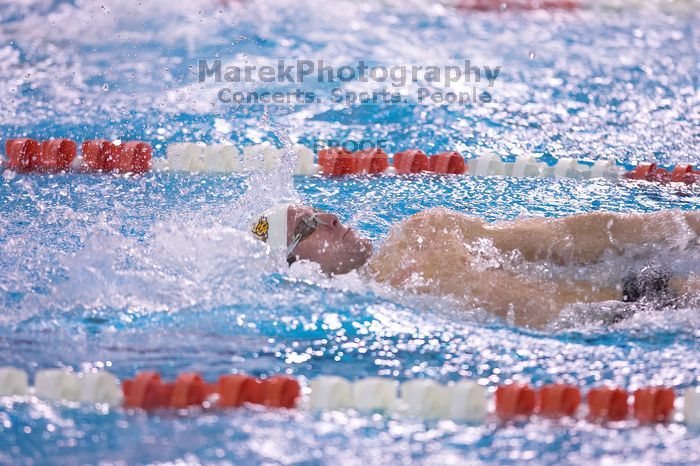 Georgia's Chris Spooner took fifth in the 100 yard backstroke with a time of 52.45.  The University of Texas Longhorns defeated The University of Georgia Bulldogs 157-135 on Saturday, January 12, 2008.

Filename: SRM_20080112_1123261.jpg
Aperture: f/2.8
Shutter Speed: 1/400
Body: Canon EOS-1D Mark II
Lens: Canon EF 300mm f/2.8 L IS