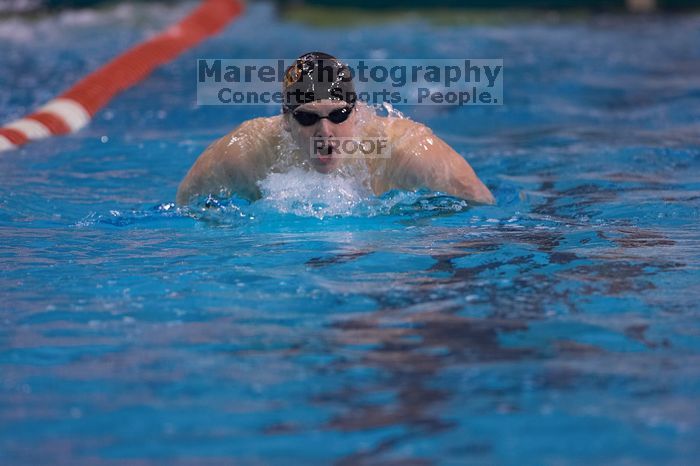 UT senior Christopher Seitz took second in the 200 yard butterfly with a time of 1:49.57.  The University of Texas Longhorns defeated The University of Georgia Bulldogs 157-135 on Saturday, January 12, 2008.

Filename: SRM_20080112_1127421.jpg
Aperture: f/2.8
Shutter Speed: 1/400
Body: Canon EOS-1D Mark II
Lens: Canon EF 300mm f/2.8 L IS