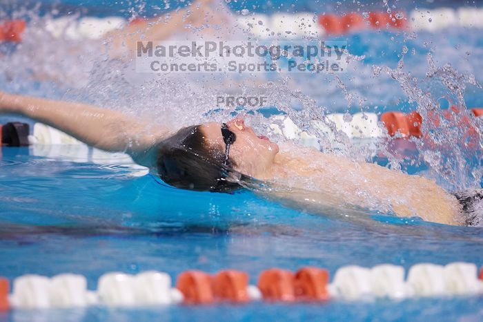 UT junior Michael Klueh took second in the 200 yard backstrong with a time of 1:50.70.  The University of Texas Longhorns defeated The University of Georgia Bulldogs 157-135 on Saturday, January 12, 2008.

Filename: SRM_20080112_1157260.jpg
Aperture: f/2.8
Shutter Speed: 1/400
Body: Canon EOS-1D Mark II
Lens: Canon EF 300mm f/2.8 L IS