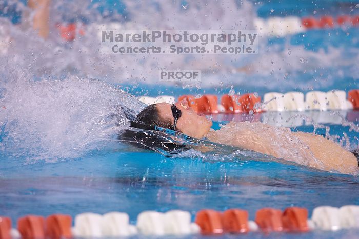 UT junior Michael Klueh took second in the 200 yard backstrong with a time of 1:50.70.  The University of Texas Longhorns defeated The University of Georgia Bulldogs 157-135 on Saturday, January 12, 2008.

Filename: SRM_20080112_1157281.jpg
Aperture: f/2.8
Shutter Speed: 1/400
Body: Canon EOS-1D Mark II
Lens: Canon EF 300mm f/2.8 L IS