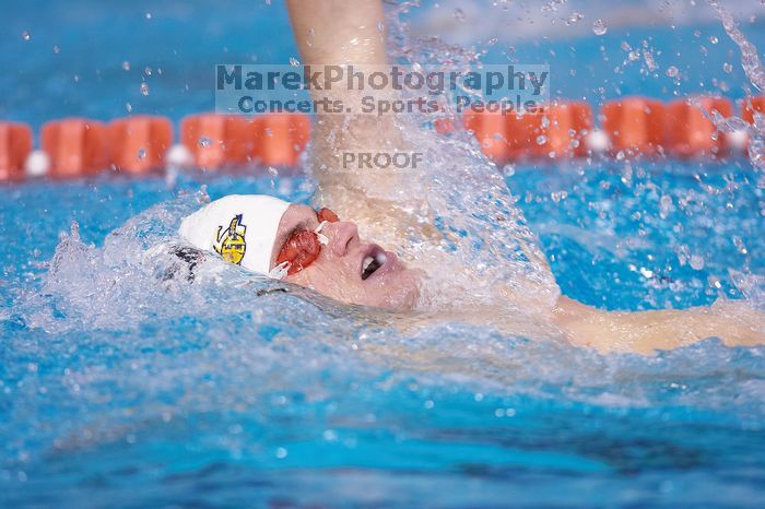 Georgia's Mark Dylla took third in the 200 yard backstroke with a time of 1:50.96.  The University of Texas Longhorns defeated The University of Georgia Bulldogs 157-135 on Saturday, January 12, 2008.

Filename: SRM_20080112_1159227.jpg
Aperture: f/2.8
Shutter Speed: 1/400
Body: Canon EOS-1D Mark II
Lens: Canon EF 300mm f/2.8 L IS