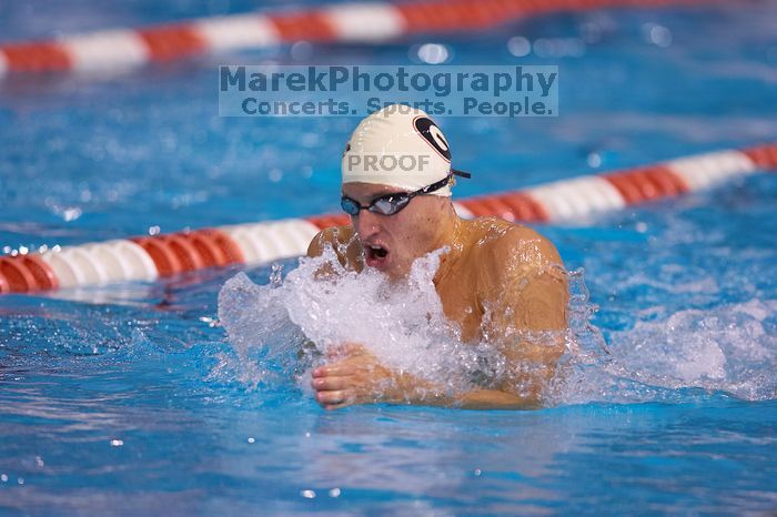 Georgia's Ashley Oliver was disqualified from the 200 yard breaststroke.  The University of Texas Longhorns defeated The University of Georgia Bulldogs 157-135 on Saturday, January 12, 2008.

Filename: SRM_20080112_1201105.jpg
Aperture: f/2.8
Shutter Speed: 1/400
Body: Canon EOS-1D Mark II
Lens: Canon EF 300mm f/2.8 L IS