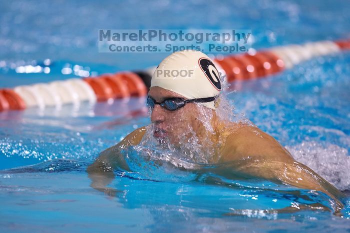 Georgia's Ashley Oliver was disqualified from the 200 yard breaststroke.  The University of Texas Longhorns defeated The University of Georgia Bulldogs 157-135 on Saturday, January 12, 2008.

Filename: SRM_20080112_1201200.jpg
Aperture: f/2.8
Shutter Speed: 1/400
Body: Canon EOS-1D Mark II
Lens: Canon EF 300mm f/2.8 L IS