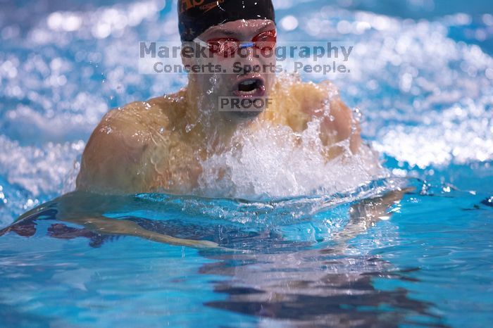 UT senior Matthew Lowe took first in the 200 yard breaststroke with a time of 2:01.46.  The University of Texas Longhorns defeated The University of Georgia Bulldogs 157-135 on Saturday, January 12, 2008.

Filename: SRM_20080112_1202043.jpg
Aperture: f/2.8
Shutter Speed: 1/400
Body: Canon EOS-1D Mark II
Lens: Canon EF 300mm f/2.8 L IS