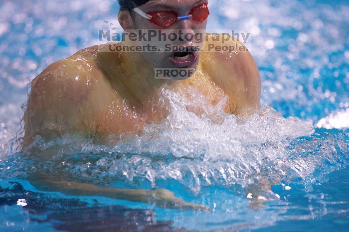 UT senior Matthew Lowe took first in the 200 yard breaststroke with a time of 2:01.46.  The University of Texas Longhorns defeated The University of Georgia Bulldogs 157-135 on Saturday, January 12, 2008.

Filename: SRM_20080112_1202107.jpg
Aperture: f/2.8
Shutter Speed: 1/400
Body: Canon EOS-1D Mark II
Lens: Canon EF 300mm f/2.8 L IS