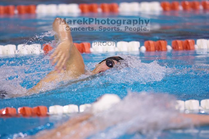 UT sophomore Ricky Berens took first  in the 500 yard freestyle with a time of 4:27.92.  The University of Texas Longhorns defeated The University of Georgia Bulldogs 157-135 on Saturday, January 12, 2008.

Filename: SRM_20080112_1204127.jpg
Aperture: f/2.8
Shutter Speed: 1/400
Body: Canon EOS-1D Mark II
Lens: Canon EF 300mm f/2.8 L IS