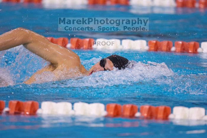 UT sophomore Ricky Berens took first  in the 500 yard freestyle with a time of 4:27.92.  The University of Texas Longhorns defeated The University of Georgia Bulldogs 157-135 on Saturday, January 12, 2008.

Filename: SRM_20080112_1204484.jpg
Aperture: f/2.8
Shutter Speed: 1/400
Body: Canon EOS-1D Mark II
Lens: Canon EF 300mm f/2.8 L IS