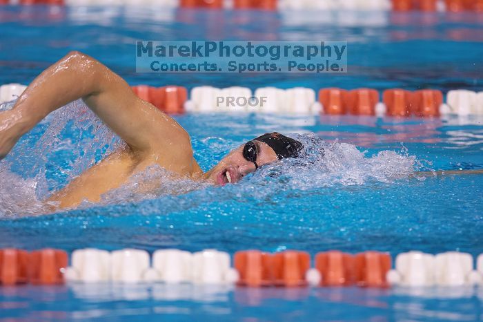 UT sophomore Ricky Berens took first  in the 500 yard freestyle with a time of 4:27.92.  The University of Texas Longhorns defeated The University of Georgia Bulldogs 157-135 on Saturday, January 12, 2008.

Filename: SRM_20080112_1205207.jpg
Aperture: f/2.8
Shutter Speed: 1/400
Body: Canon EOS-1D Mark II
Lens: Canon EF 300mm f/2.8 L IS