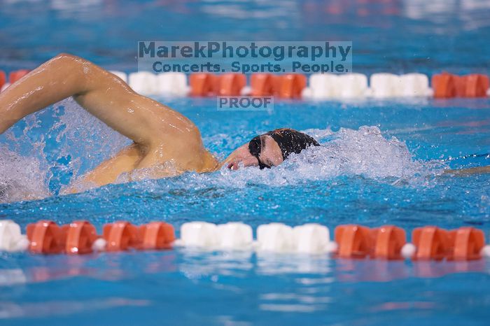 UT sophomore Ricky Berens took first  in the 500 yard freestyle with a time of 4:27.92.  The University of Texas Longhorns defeated The University of Georgia Bulldogs 157-135 on Saturday, January 12, 2008.

Filename: SRM_20080112_1206041.jpg
Aperture: f/2.8
Shutter Speed: 1/400
Body: Canon EOS-1D Mark II
Lens: Canon EF 300mm f/2.8 L IS