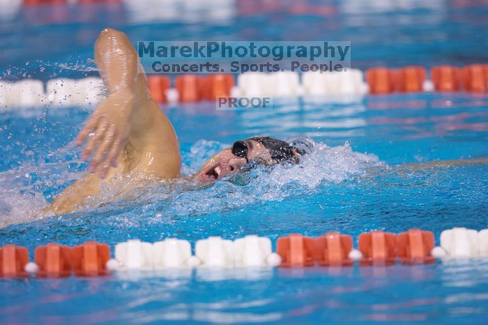 UT sophomore Ricky Berens took first  in the 500 yard freestyle with a time of 4:27.92.  The University of Texas Longhorns defeated The University of Georgia Bulldogs 157-135 on Saturday, January 12, 2008.

Filename: SRM_20080112_1206084.jpg
Aperture: f/2.8
Shutter Speed: 1/400
Body: Canon EOS-1D Mark II
Lens: Canon EF 300mm f/2.8 L IS