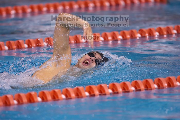 UT sophomore Ricky Berens took first  in the 500 yard freestyle with a time of 4:27.92.  The University of Texas Longhorns defeated The University of Georgia Bulldogs 157-135 on Saturday, January 12, 2008.

Filename: SRM_20080112_1206160.jpg
Aperture: f/2.8
Shutter Speed: 1/400
Body: Canon EOS-1D Mark II
Lens: Canon EF 300mm f/2.8 L IS