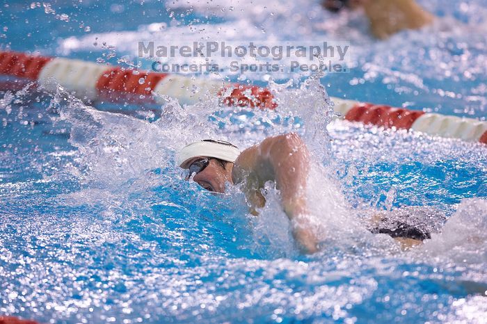 Georgia's Troyden Prinsloo took third in the 500 yard freestyle with a time of 4:30.68.  The University of Texas Longhorns defeated The University of Georgia Bulldogs 157-135 on Saturday, January 12, 2008.

Filename: SRM_20080112_1207303.jpg
Aperture: f/2.8
Shutter Speed: 1/400
Body: Canon EOS-1D Mark II
Lens: Canon EF 300mm f/2.8 L IS