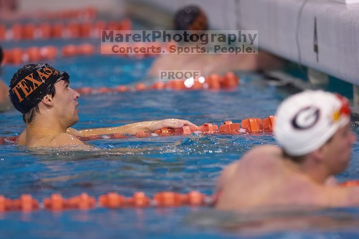 UT sophomore Ricky Berens took first  in the 500 yard freestyle with a time of 4:27.92.  The University of Texas Longhorns defeated The University of Georgia Bulldogs 157-135 on Saturday, January 12, 2008.

Filename: SRM_20080112_1208327.jpg
Aperture: f/2.8
Shutter Speed: 1/400
Body: Canon EOS-1D Mark II
Lens: Canon EF 300mm f/2.8 L IS