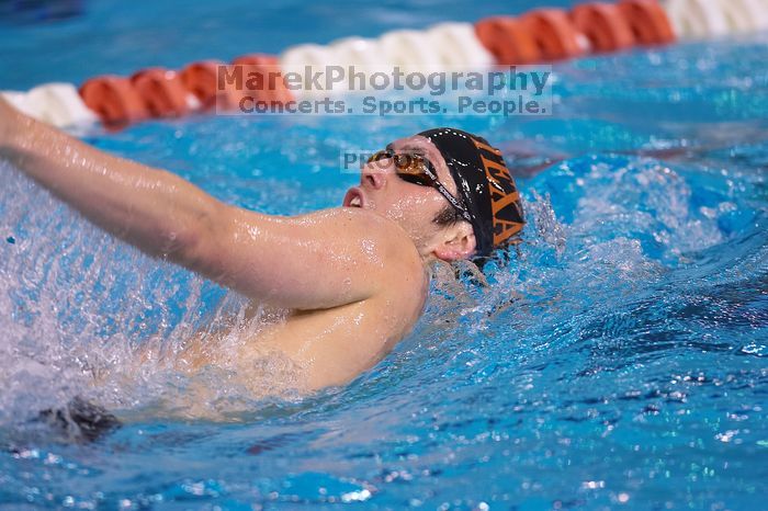 UT sophomore Trey Hoover competed in the 400 yard IM with a time of 4:10.06.  The University of Texas Longhorns defeated The University of Georgia Bulldogs 157-135 on Saturday, January 12, 2008.

Filename: SRM_20080112_1238565.jpg
Aperture: f/2.8
Shutter Speed: 1/400
Body: Canon EOS-1D Mark II
Lens: Canon EF 300mm f/2.8 L IS