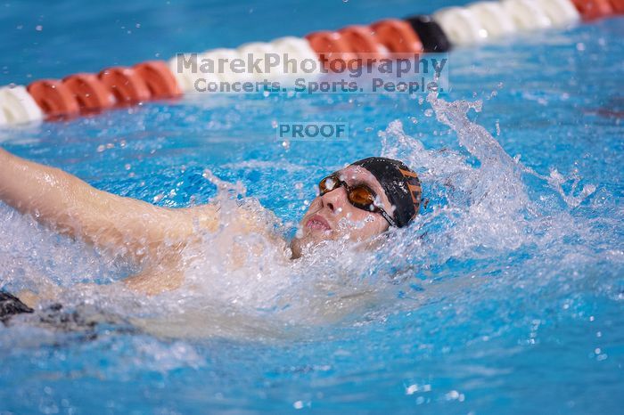 UT sophomore Trey Hoover competed in the 400 yard IM with a time of 4:10.06.  The University of Texas Longhorns defeated The University of Georgia Bulldogs 157-135 on Saturday, January 12, 2008.

Filename: SRM_20080112_1239081.jpg
Aperture: f/2.8
Shutter Speed: 1/400
Body: Canon EOS-1D Mark II
Lens: Canon EF 300mm f/2.8 L IS