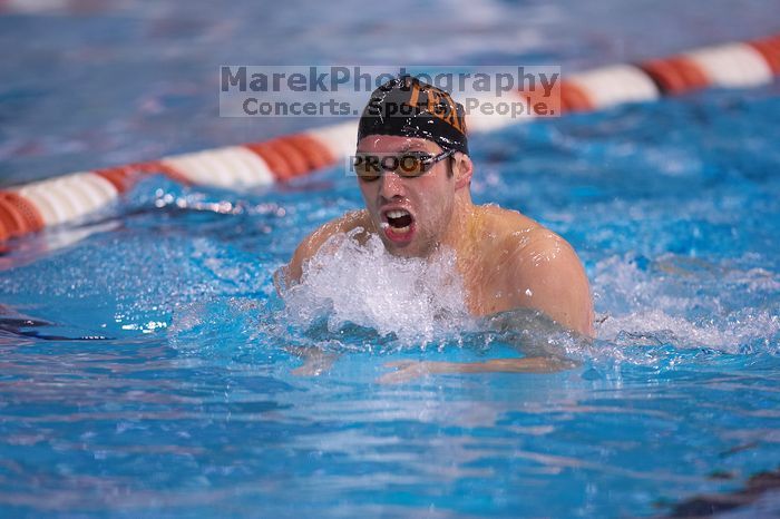 UT sophomore Trey Hoover competed in the 400 yard IM with a time of 4:10.06.  The University of Texas Longhorns defeated The University of Georgia Bulldogs 157-135 on Saturday, January 12, 2008.

Filename: SRM_20080112_1239507.jpg
Aperture: f/2.8
Shutter Speed: 1/400
Body: Canon EOS-1D Mark II
Lens: Canon EF 300mm f/2.8 L IS