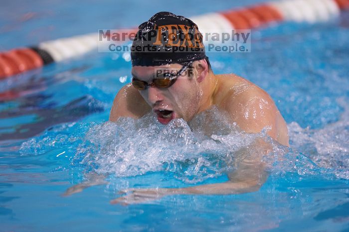 UT sophomore Trey Hoover competed in the 400 yard IM with a time of 4:10.06.  The University of Texas Longhorns defeated The University of Georgia Bulldogs 157-135 on Saturday, January 12, 2008.

Filename: SRM_20080112_1240045.jpg
Aperture: f/2.8
Shutter Speed: 1/400
Body: Canon EOS-1D Mark II
Lens: Canon EF 300mm f/2.8 L IS