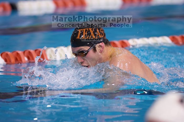 UT sophomore Trey Hoover competed in the 400 yard IM with a time of 4:10.06.  The University of Texas Longhorns defeated The University of Georgia Bulldogs 157-135 on Saturday, January 12, 2008.

Filename: SRM_20080112_1240340.jpg
Aperture: f/2.8
Shutter Speed: 1/400
Body: Canon EOS-1D Mark II
Lens: Canon EF 300mm f/2.8 L IS